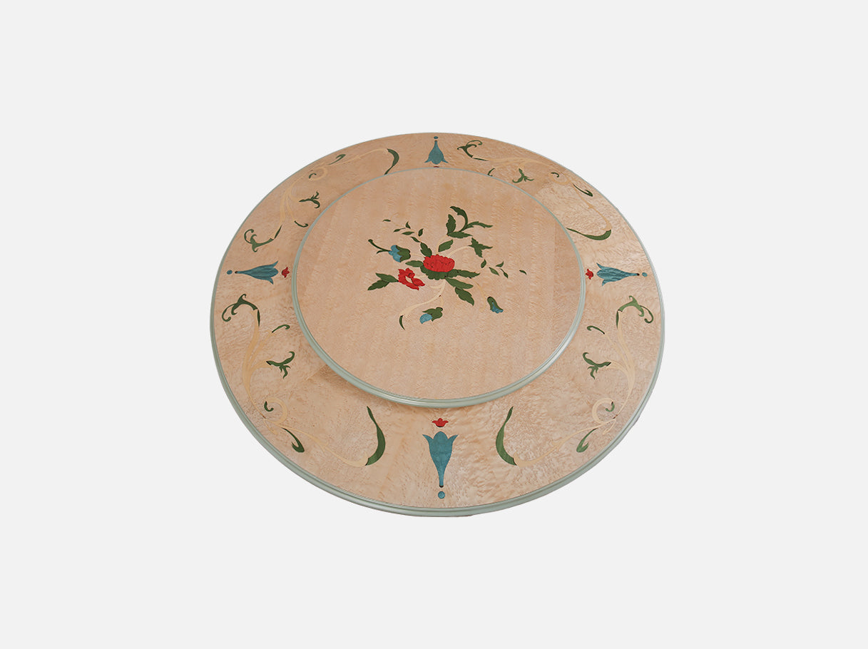 Close-up of D-083 wood dining table pedestal — beech wood carved gold leaf details and sculpted architectural motifs