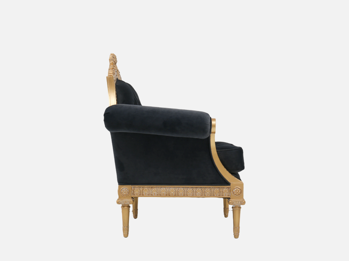 Side view of A-1178 sofa chair single emphasizing its tapered gold leaf legs and sculpted backrest