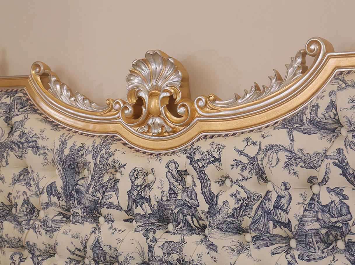 Decorative crest detail of French bed B-072 with hand-carved beechwood and gold leaf finish.