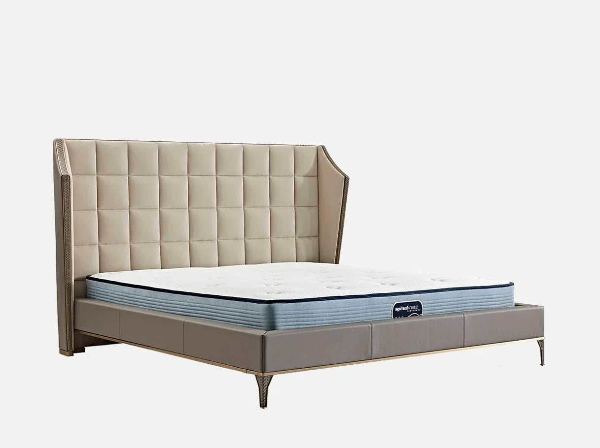 Angle view of MB-3115 high end wingback bed showcasing 304 stainless steel brass-plated details and wingback headboard