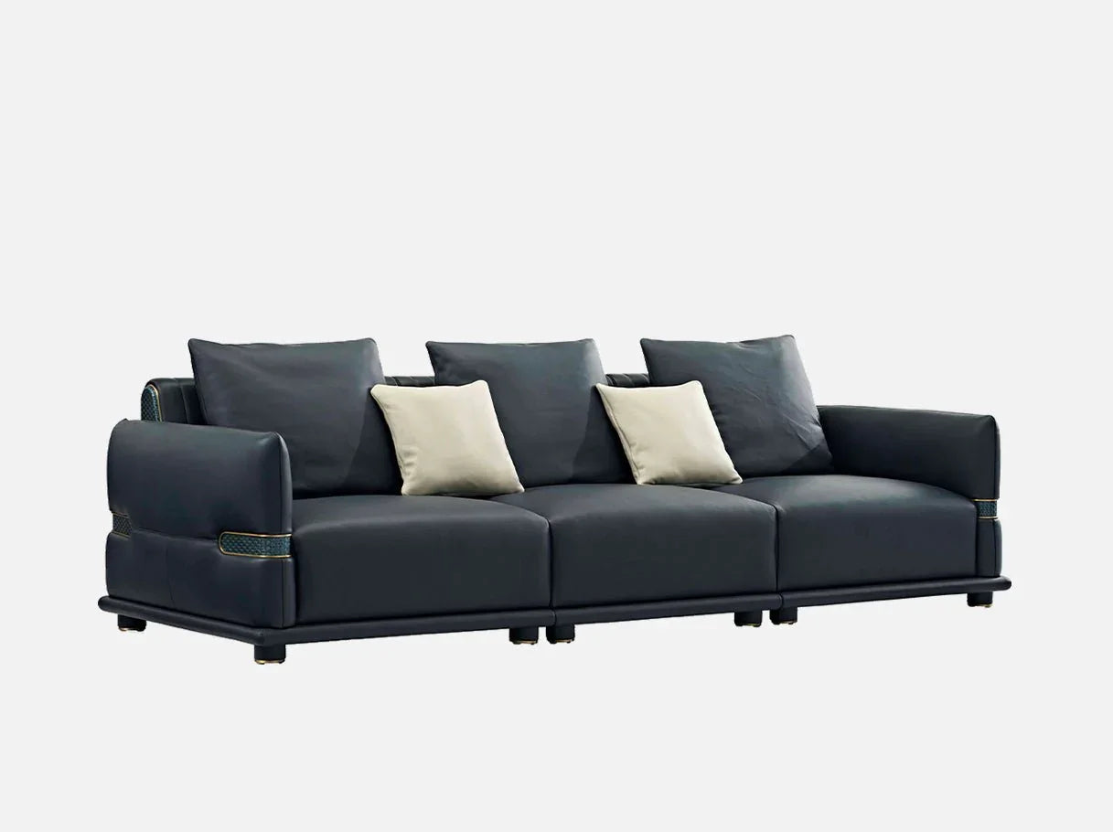 Side angle of MS-3130 modern black leather sofa showcasing 304 stainless steel brass-plated frame details and tailored black silhouette