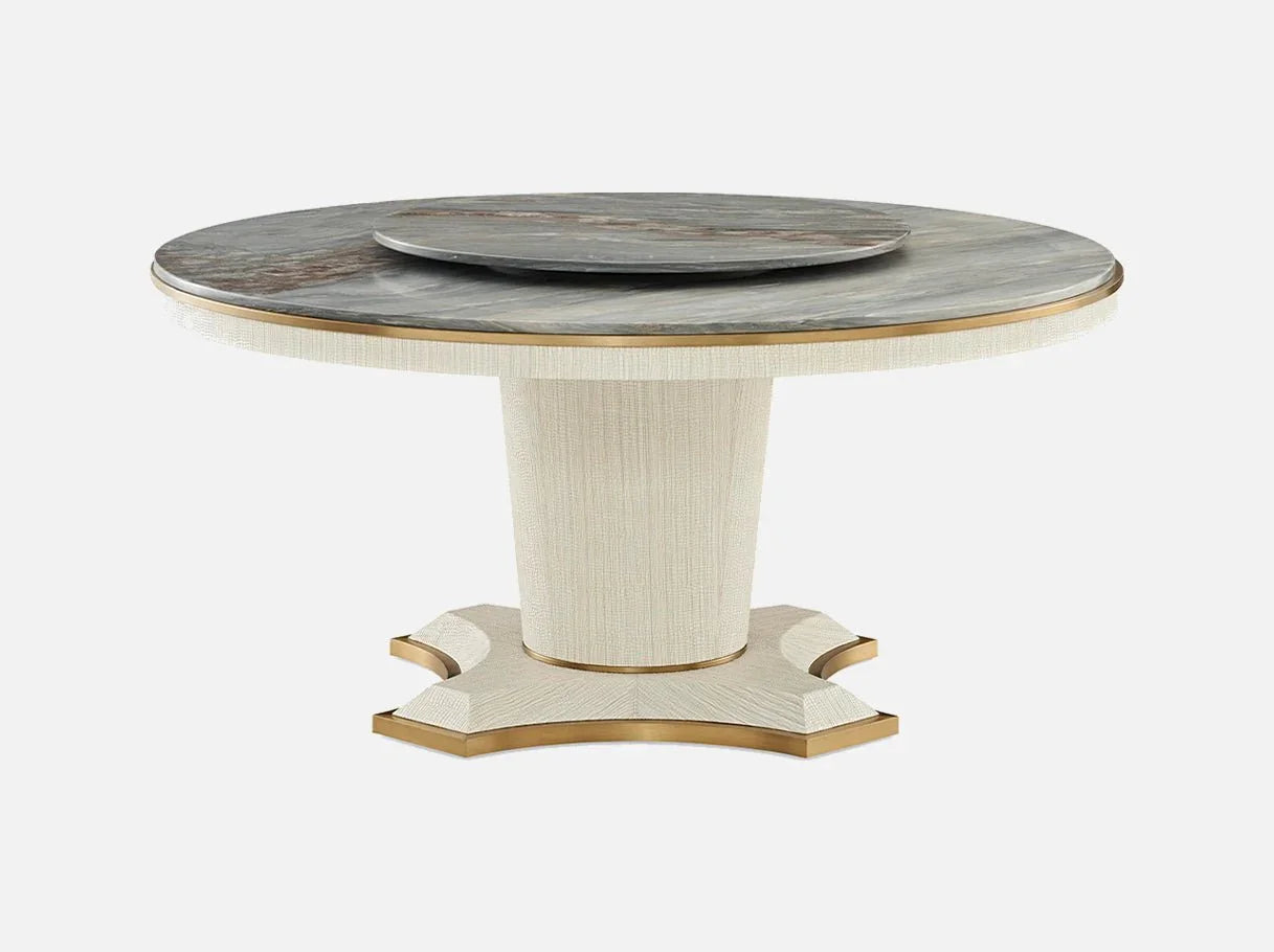 Angle view of MD-2021 marble round dining table showcasing Blue Sand marble’s soft blue hues, golden flecks, and Art Deco-inspired brass details