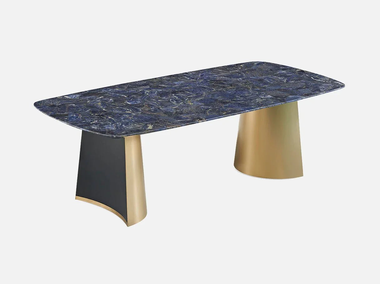 Angle view of MD-2887 contemporary dining table showcasing sapphire-like marble’s deep blue hues and brass-plated accents