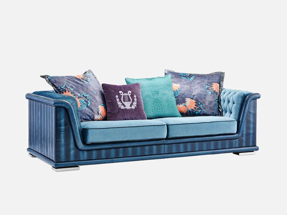 Side angle of MS-2002 modern style sofa showcasing 304 stainless steel base details and tailored blue silhouette