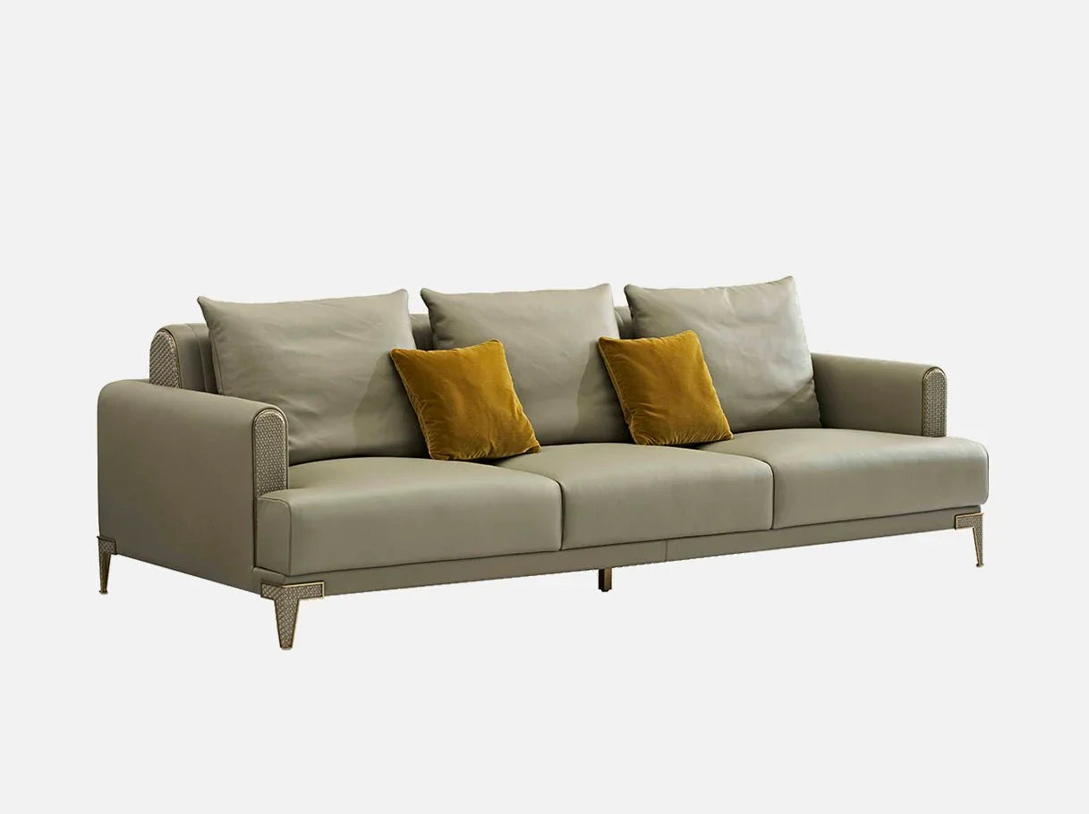 Side angle of MS-3130 sofa highlighting Arc de Triomphe-inspired design with leather upholstery and brass edging.