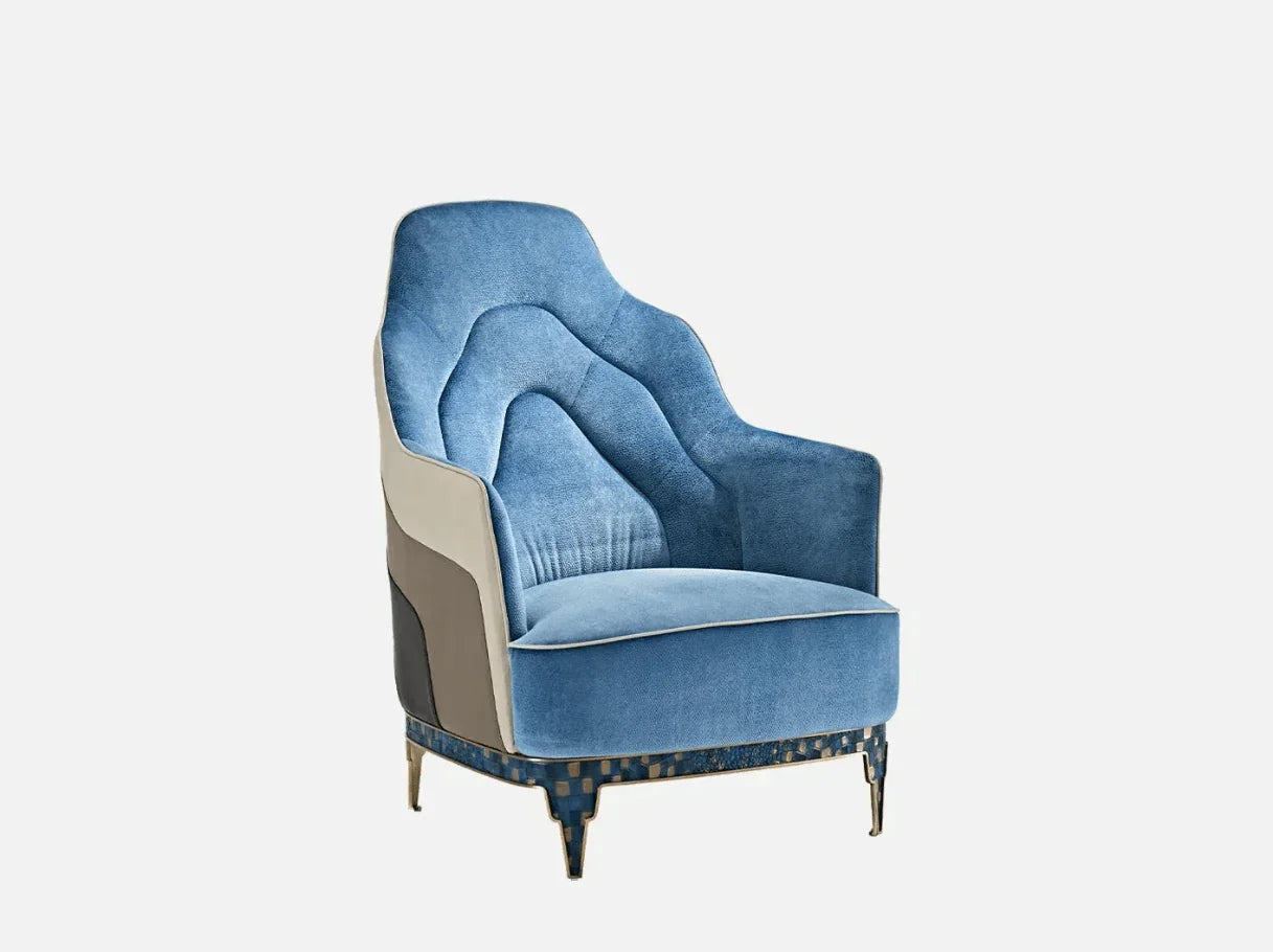 Side angle of MA-2927 accent chair modern showcasing 304 stainless steel brass-plated legs and sculptural blue silhouette