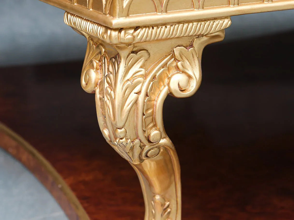 Close-up of CT-0506 solid wood coffee table leg showing hand-carved details and gold leaf highlights for timeless artistry.