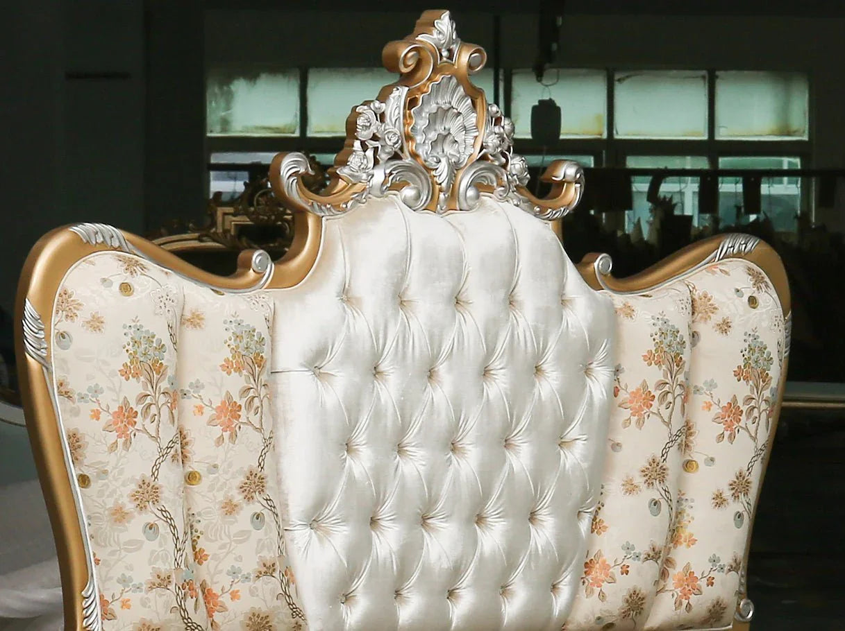 Close-up of B-320 headboard tufted velvet upholstery framed by floral jacquard and silver-gilded details.