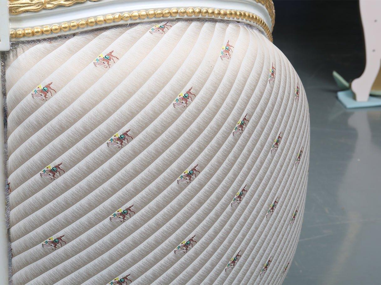 Detail of B-041 French bed upholstered in jacquard fabric with tufted velvet texture and refined craftsmanship.