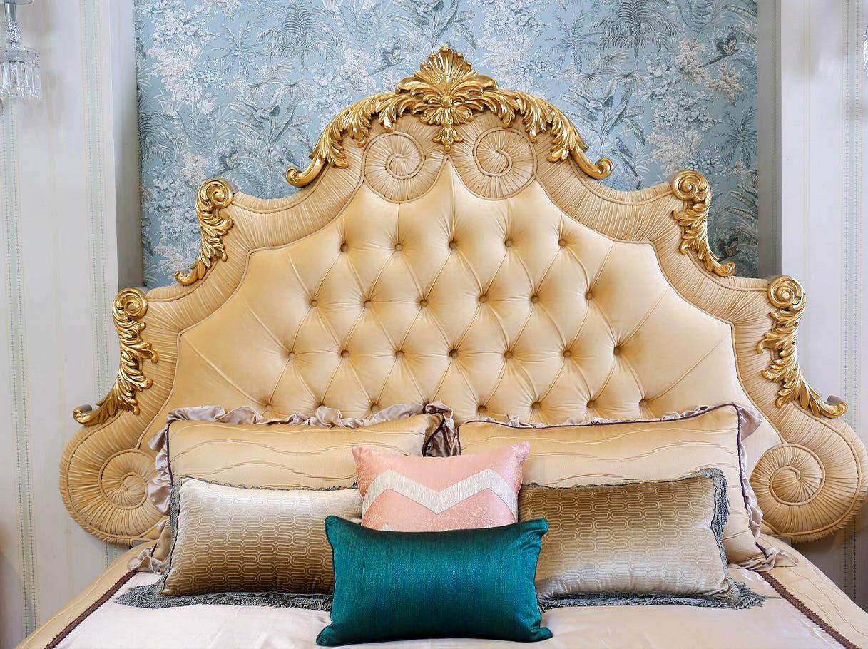 Close-up of B-042 gold bed tufted velvet headboard framed with gilded wood carving and luxury velvet bedding.