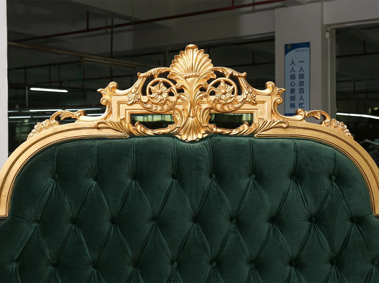 Close-up of B-048 French bed headboard crest with carved detailing and tufted velvet panel.
