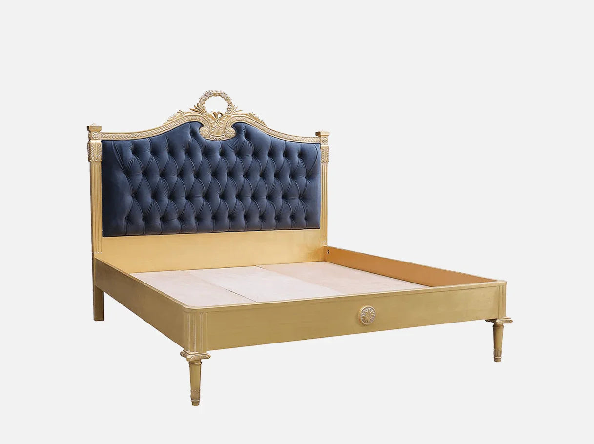 Side view of French luxury bed B-077 with arched velvet upholstered headboard and gold leaf finish.