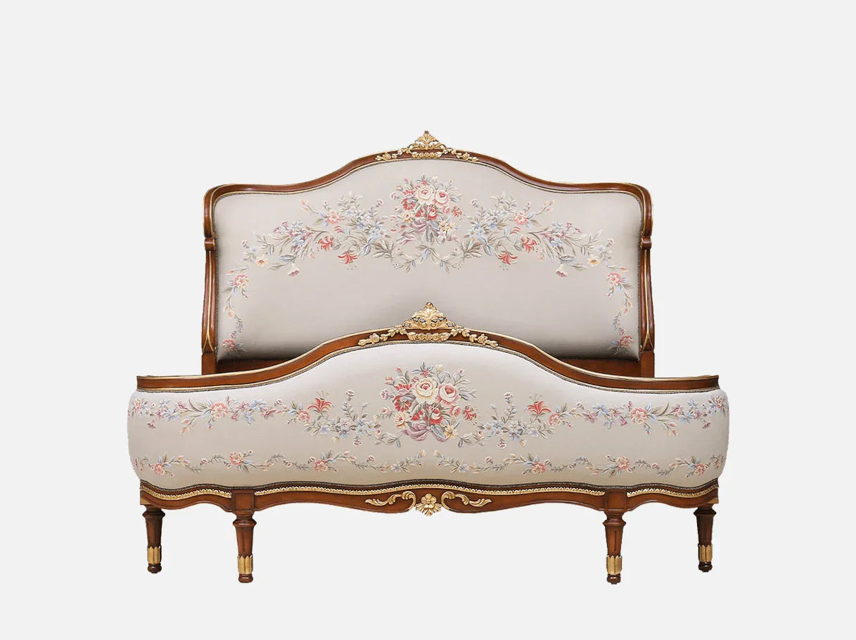 Front view of French bed B-082 with jacquard upholstery and carved beechwood frame.