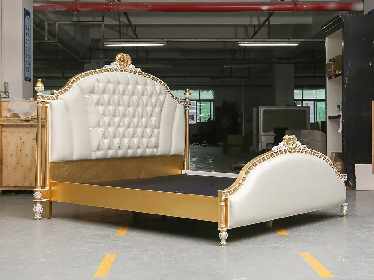 Side view of B-087 classical bed showing hand-carved frame and upholstery.