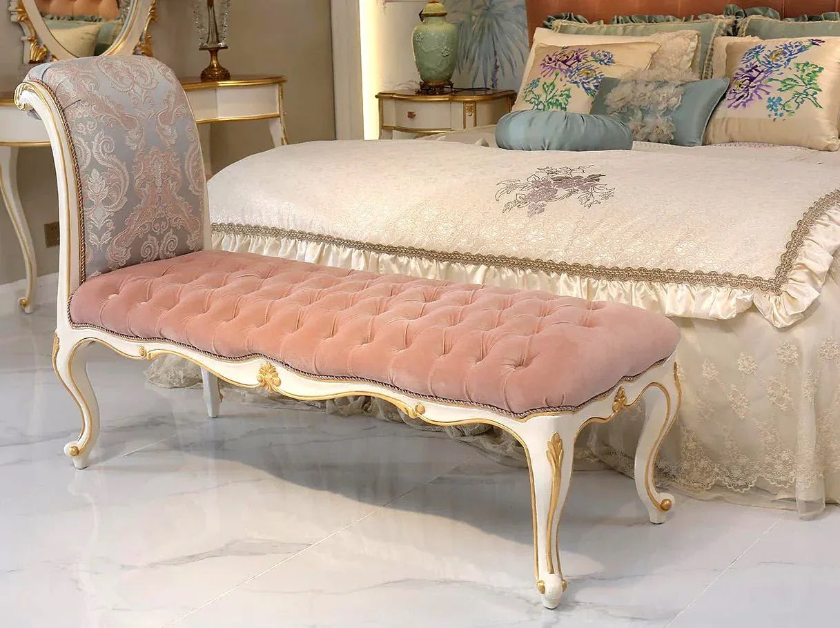 Upholstered french bench at the foot of the bed for luxury bedroom décor