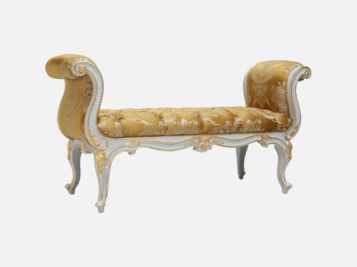 French style bedroom bench with gold leaf finish and rolled arms