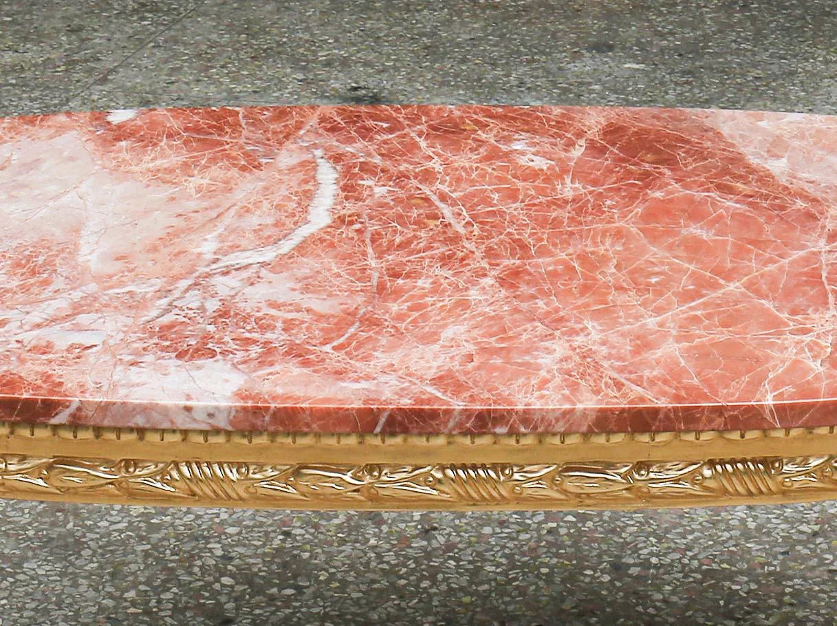 Detailed shot of Oval Coffee Table CT-0020 highlighting marble texture and carved apron.