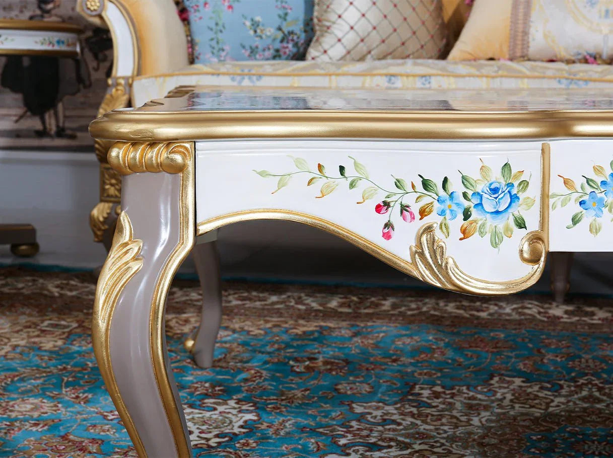 CT-1162 vintage coffee table leg and apron close-up showing gold leaf carving and floral artistry