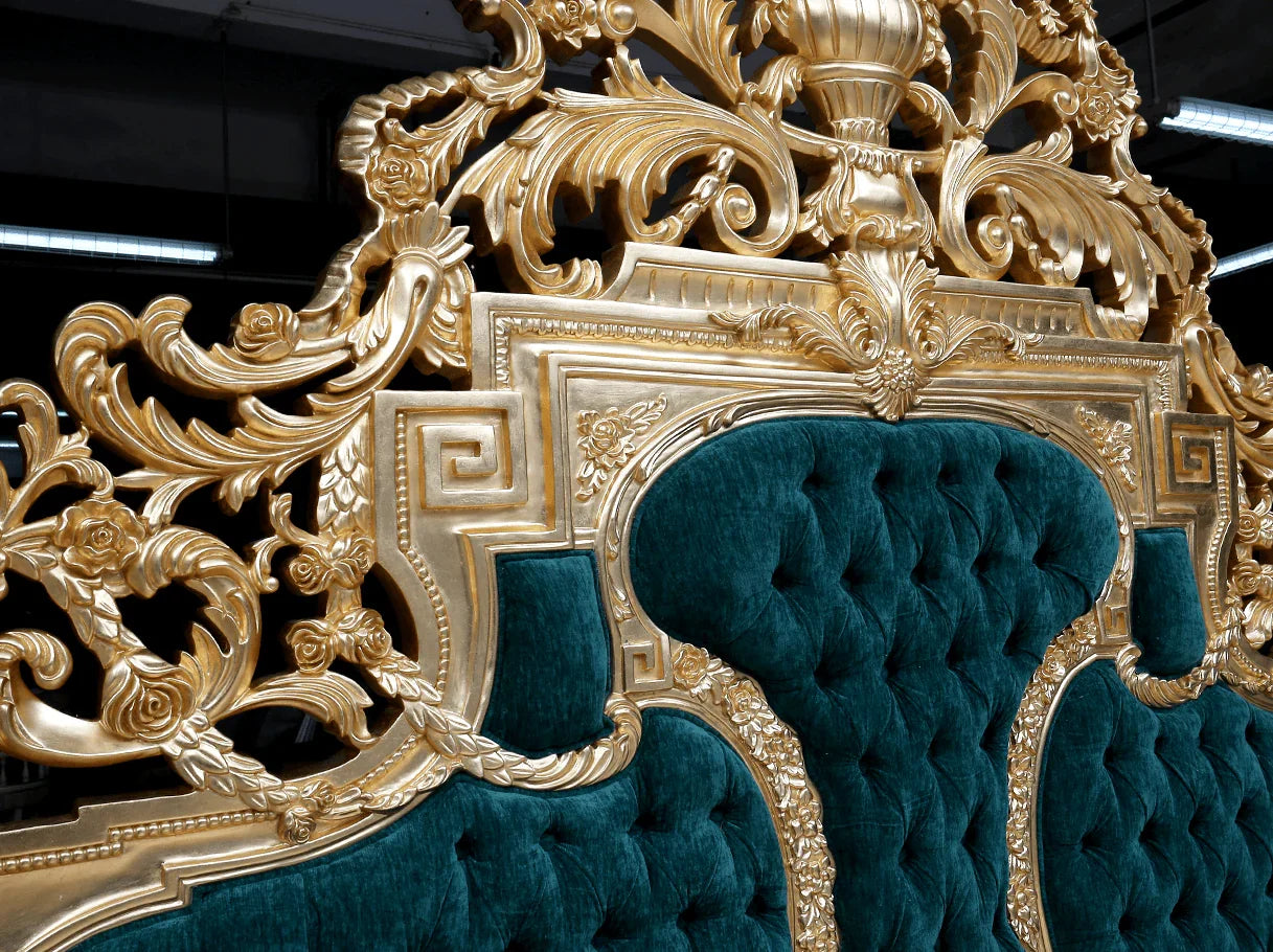 Detail of B-080 French luxury bed headboard with hand-carved scrolls, floral flourishes, and plush button-tufted velvet panel.
