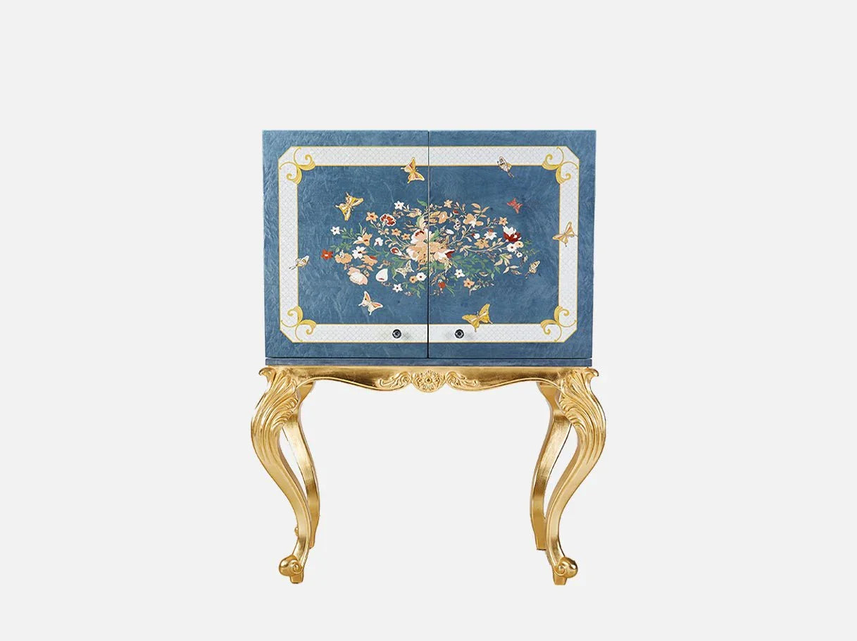 Blue accent cabinet C-617 front: Hand-painted floral/butterfly motifs, gold leaf trim, blue wood-veneer – ideal for luxury interiors.