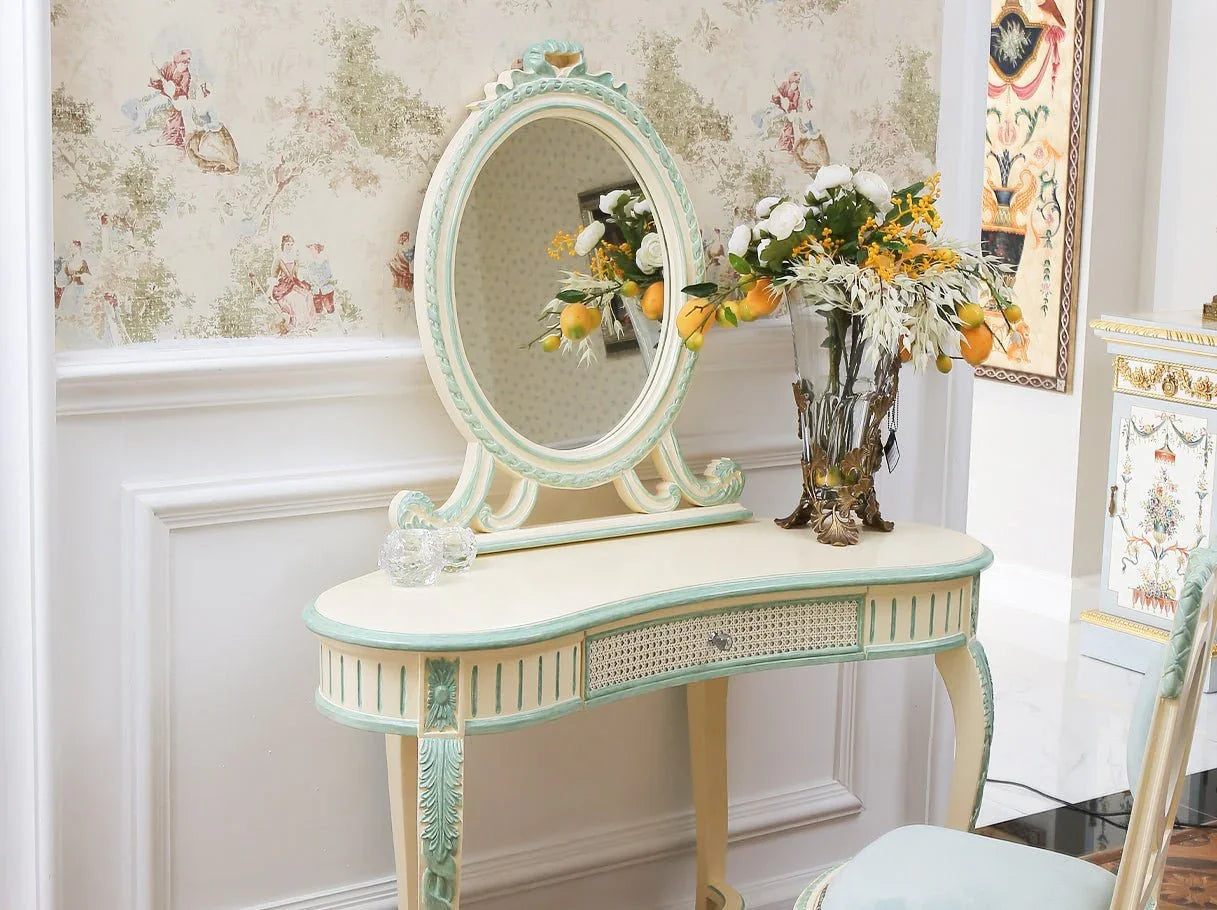 French vanity table in solid wood with gold leaf accents and central drawer.