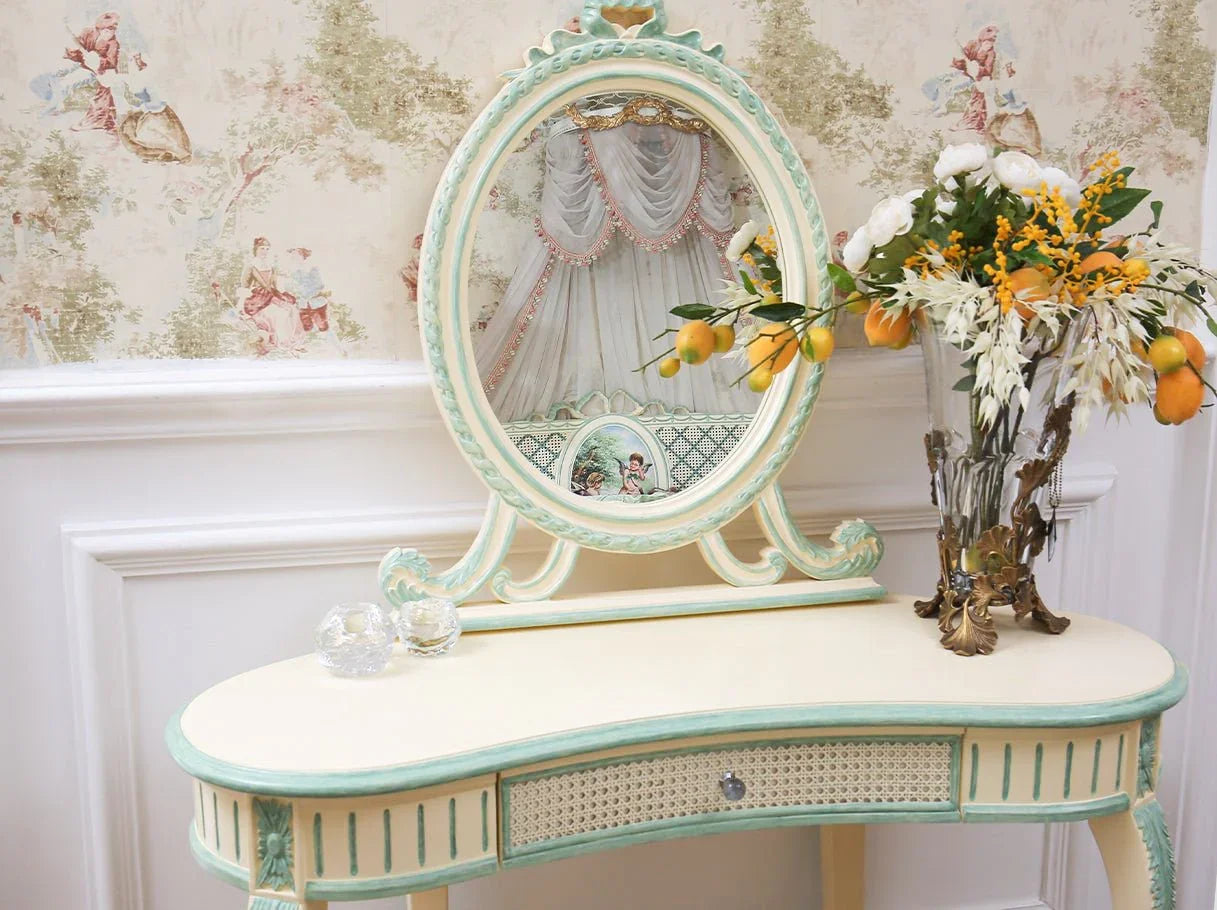 Luxury solid wood dresser with ornate carved mirror in a classical bedroom setting.