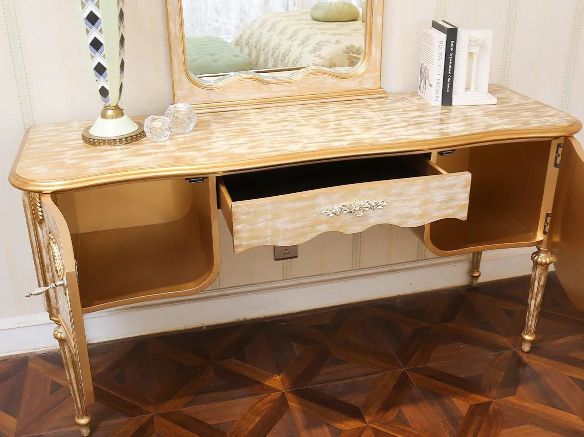 Drawer detail of gold vanity V-081 showing elegant handles and refined carving.