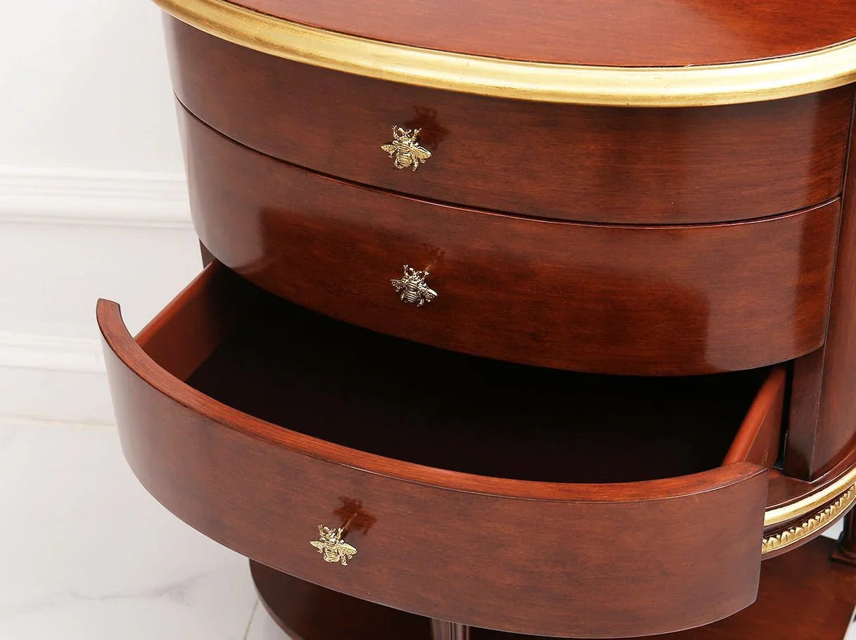 Drawer detail of dark wood vanity V-082 highlighting gold leaf finish and wooden texture.