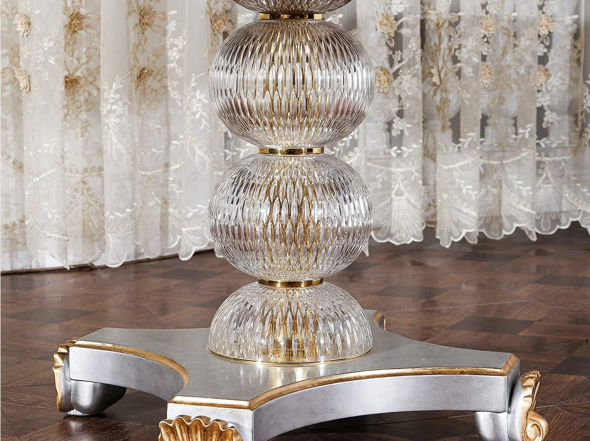 D-086 dining table base detail: Baraka crystal elements, carved wood with gold accents – highlights craftsmanship.