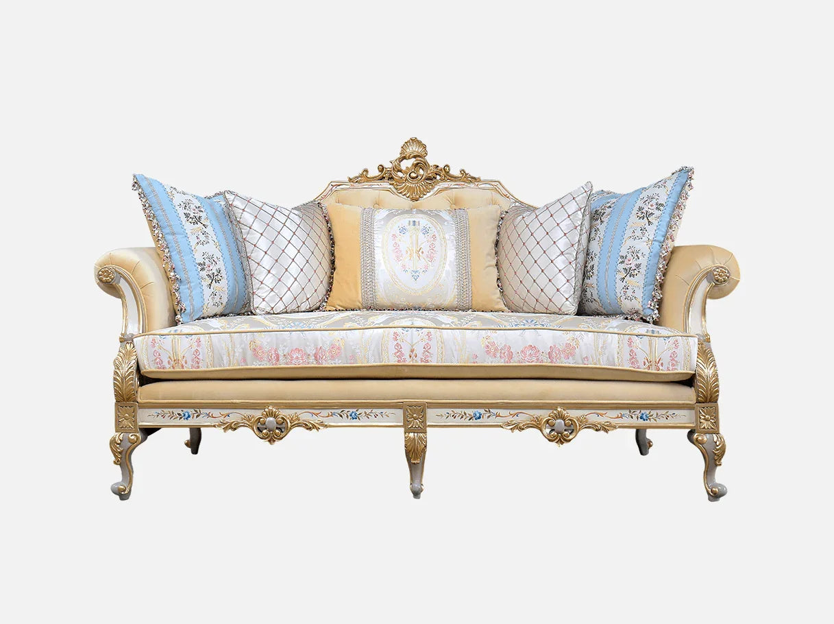 Front view of French sofa S-1138 showcasing hand-carved beech wood frame with gold leaf and painted detailing, upholstered in jacquard and velvet.