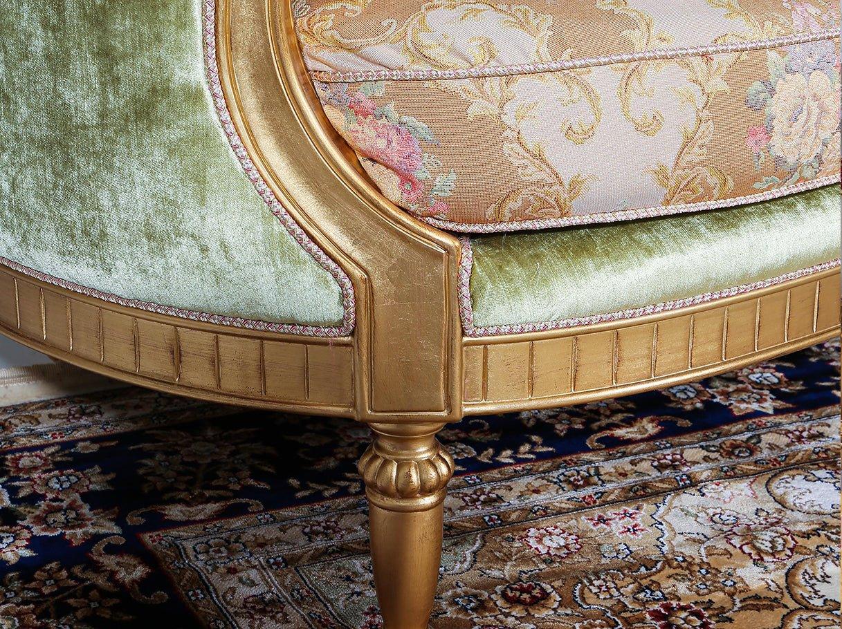 Detail of French sofa S-1146 leg and arm frame, highlighting jacquard fabric, velvet trim, and shimmering gold & silver leaf craftsmanship.