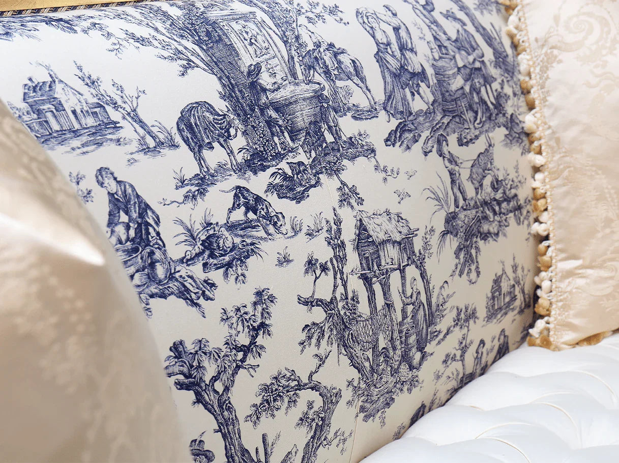 Toile jacquard fabric detail of French sofa S-1172, showing intricate blue vintage motifs on a soft white background for elegant texture.