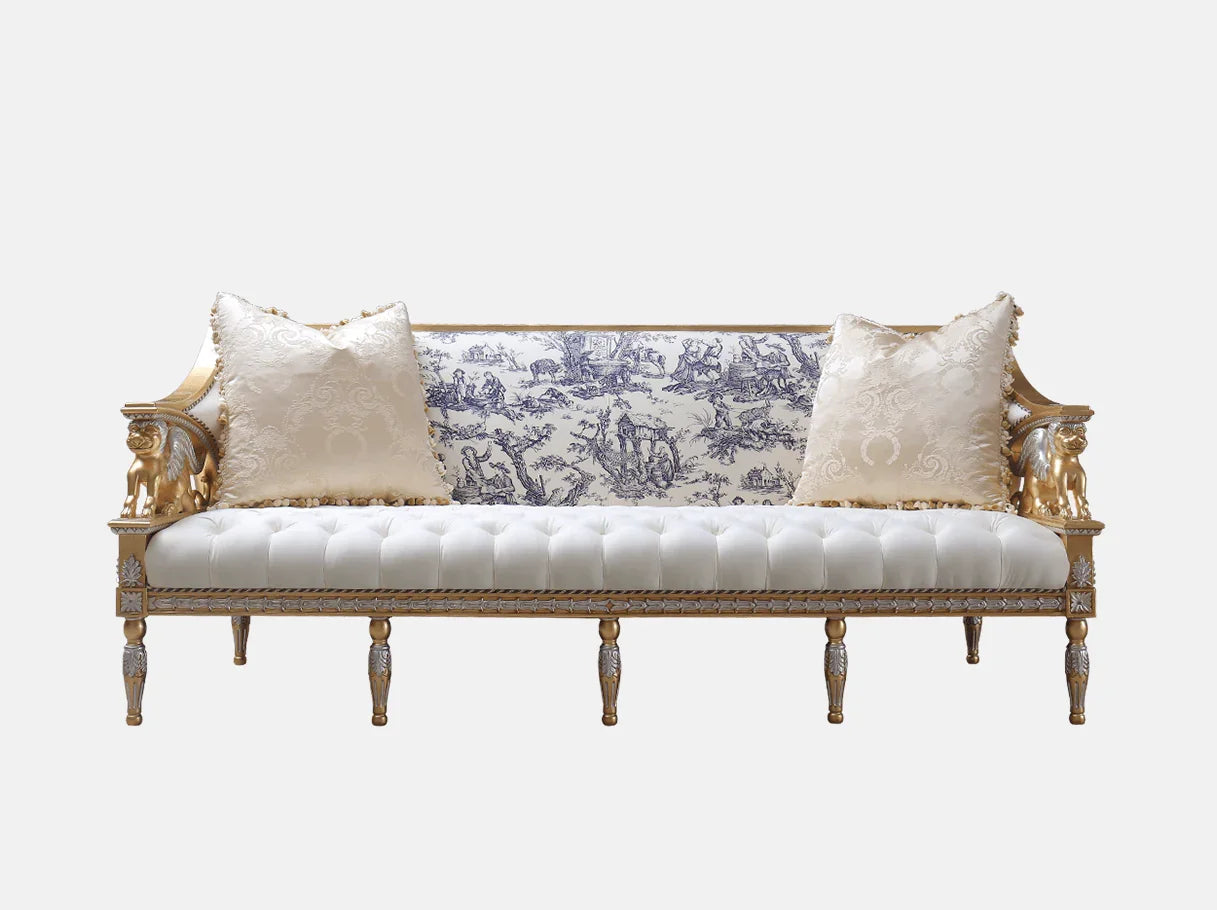 Front view of French sofa S-1172 with gold-carved beech wood frame, toile jacquard back, ivory seat cushions, and champagne pillows.