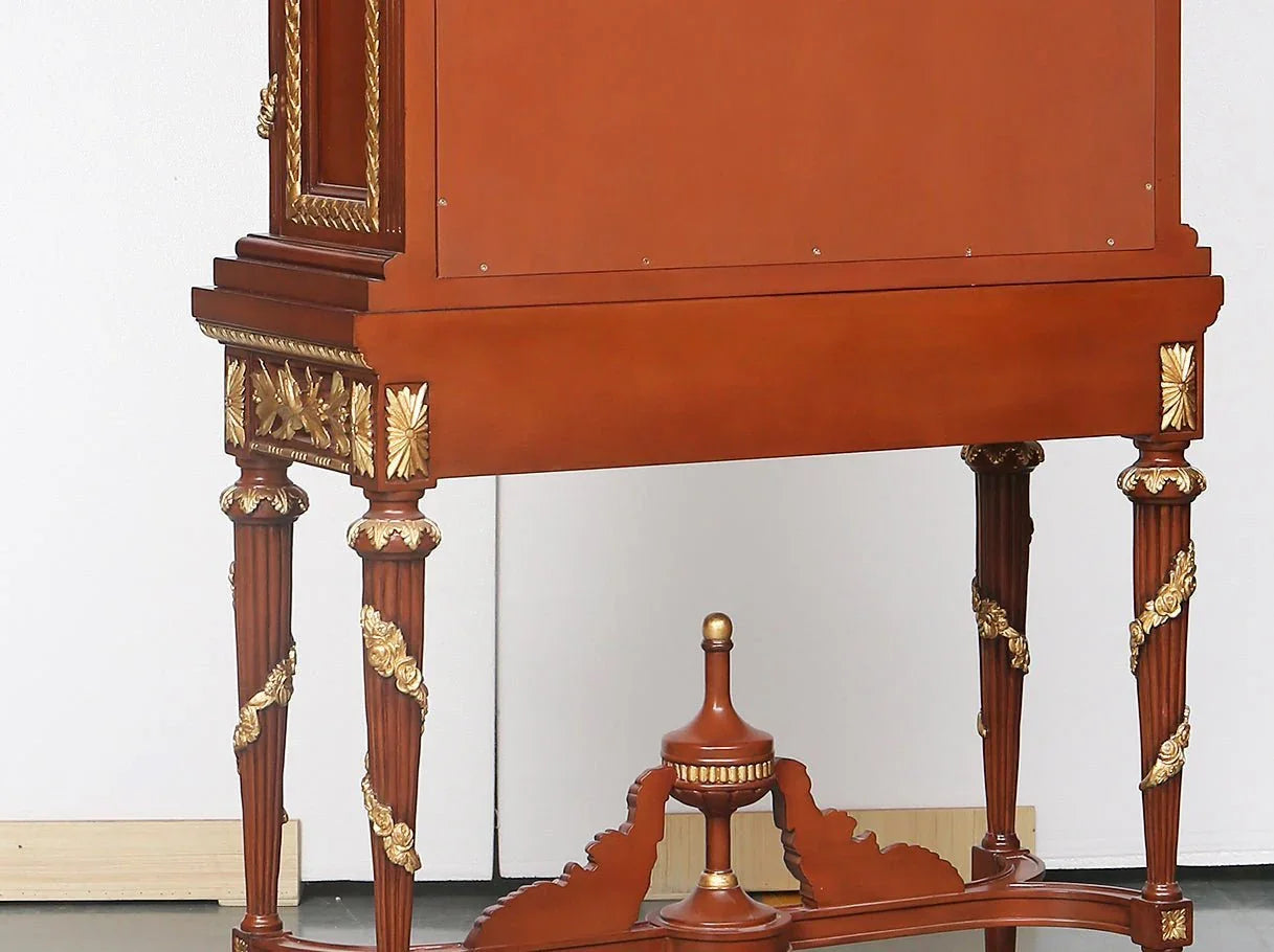 Tall cabinet C-0221 leg detail: Carved beech wood legs with gold leaf embellishments – emphasizes durable structure.