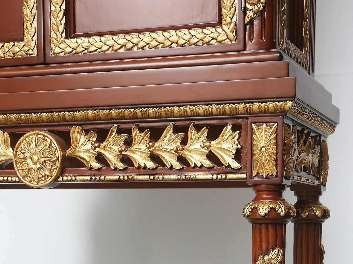 Tall cabinet C-0221 hardware detail: Ornate gold door handles, paired with carved wood – emphasizes luxury design.