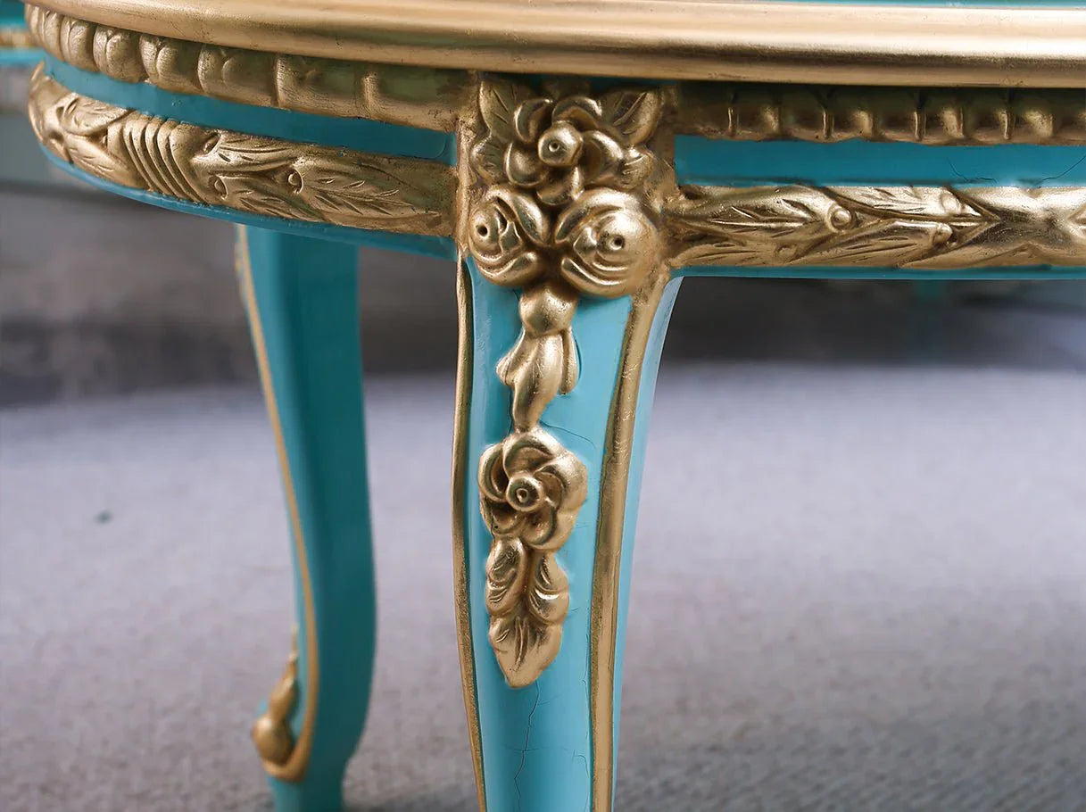 Detail shot of CT-0020 carved leg with gold leaf highlights.