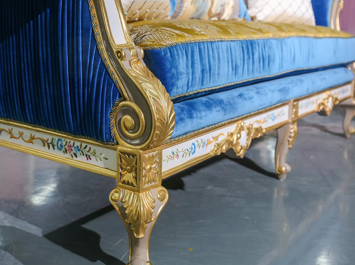 Base and leg detail of French sofa S-1138 highlighting floral hand-painted trims on gold-finished carved wood.
