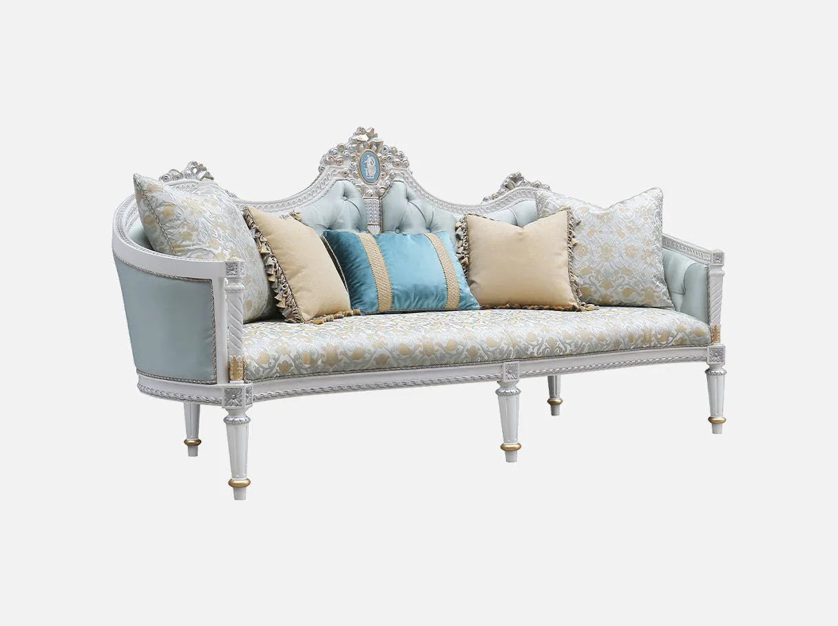 Side view of French sofa S-1179 in soft blue tones, showcasing sculpted arms, carved beech wood frame, and elegant gold-silver detailing.