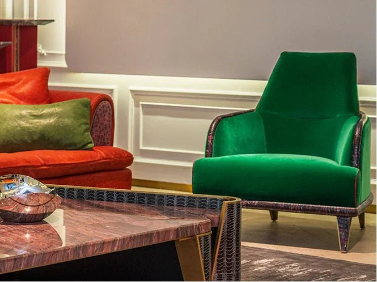 Close-up of velvet armchair MA-2586 highlighting embossed leather and exotic frame