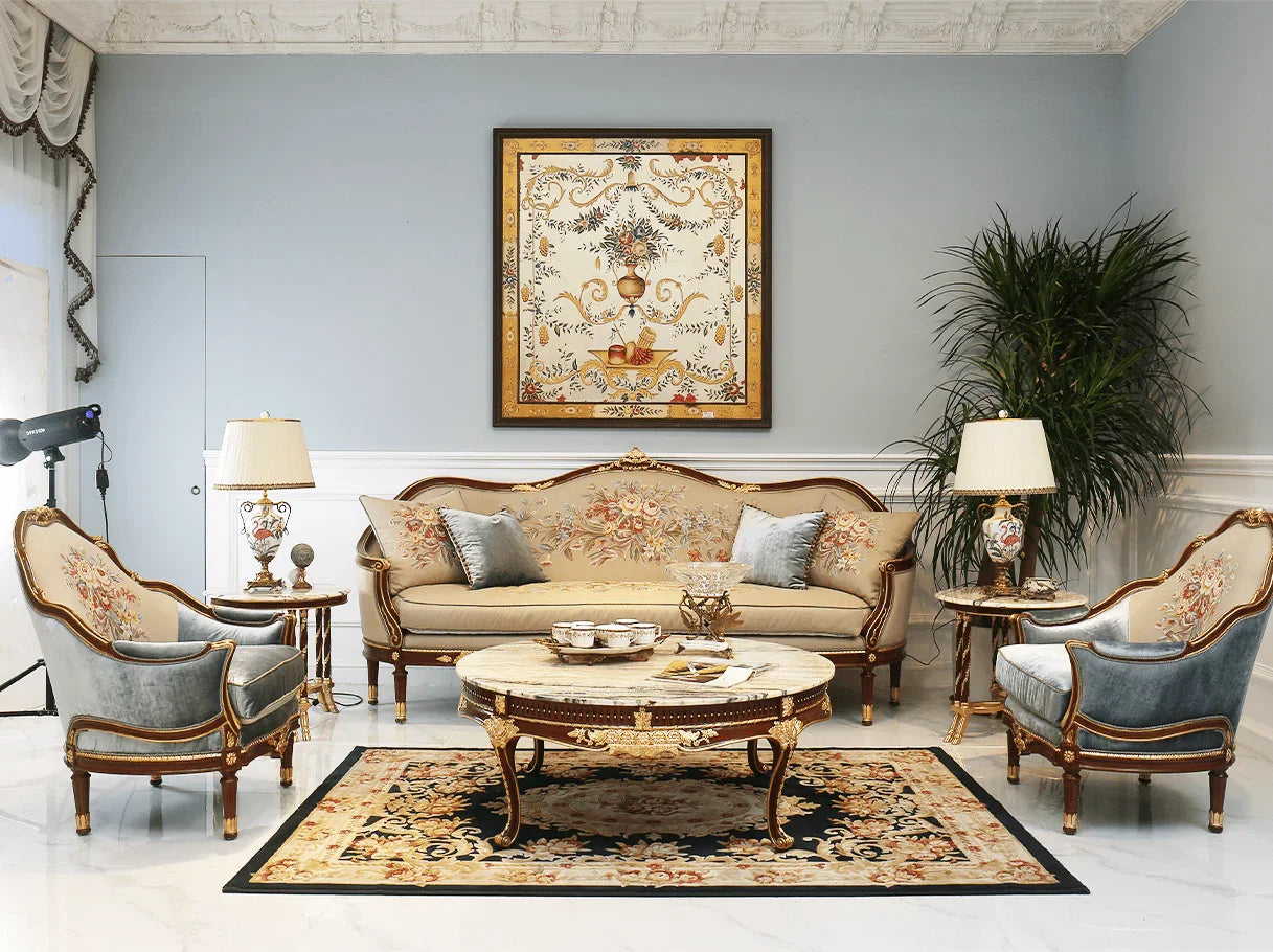 French style living room with French sofa S-0659 as centerpiece, surrounded by matching armchairs and a marble table.