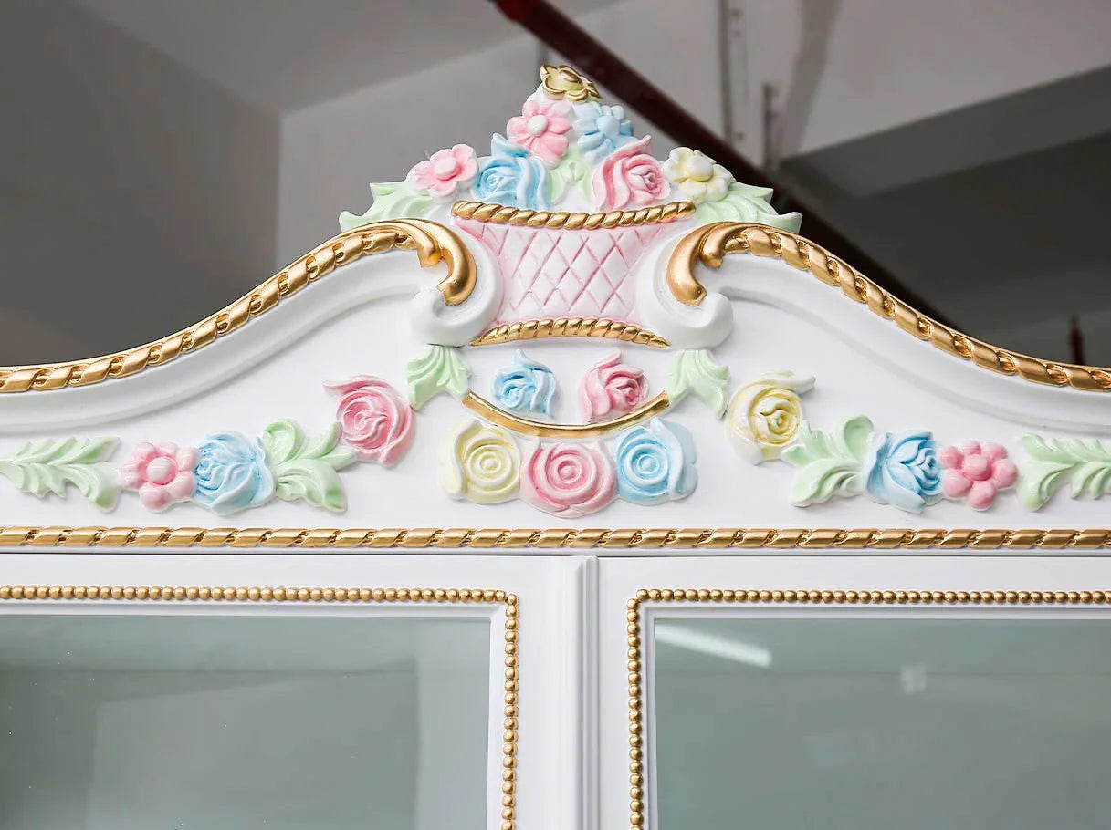 Liquor cabinet C-454 top detail: Ornate carved shape with colorful hand-painted flowers, gold leaf trim.