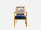 Front view of AC-404 navy armchair highlighting its neoclassical silhouette, gold leaf styling, and space integration