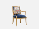 Side view of AC-404 navy armchair showcasing its hand-carved frame, gold leaf accents, and dual-texture upholstery