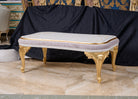 Angle view of CT-725 coffee table showcasing carved legs and pleated velvet side panel