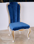 Angle view of DC-073 dining chair showcasing curved carved legs and creamy white frame base